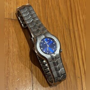 TAG Heuer Alter Ego ladies' quartz watch with a blue dial and diamond hour marke